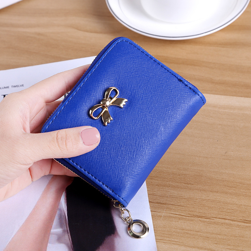 The New lovely Fresh Small wallet Bow tie zipper Coin Purse Female student Wild Hand bag