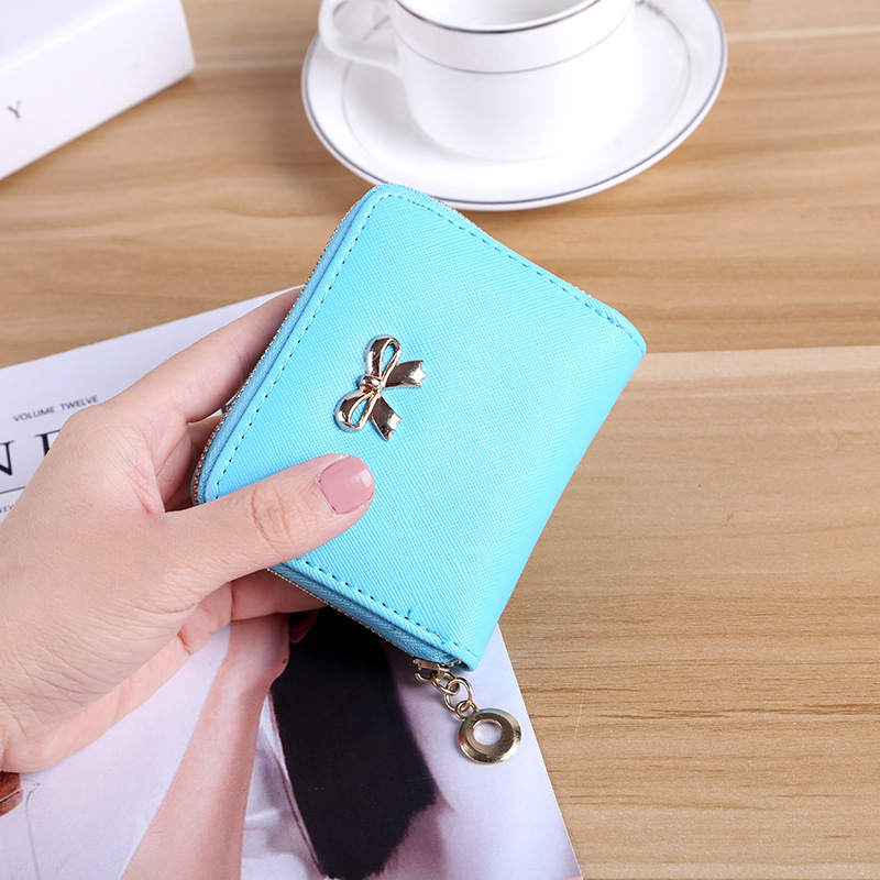 The New lovely Fresh Small wallet Bow tie zipper Coin Purse Female student Wild Hand bag