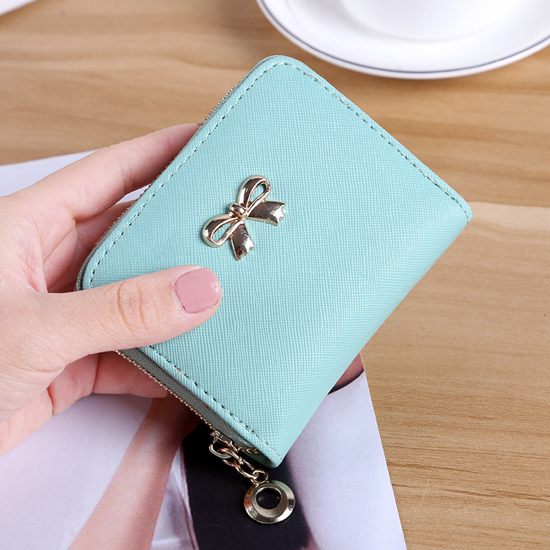 The New lovely Fresh Small wallet Bow tie zipper Coin Purse Female student Wild Hand bag