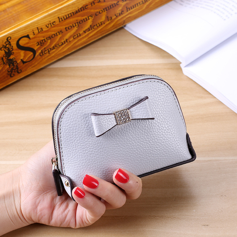 The New Mini Coin Purse Female Fashion Leisure Hand Bag Small Wallet Storage Package Coin Bag