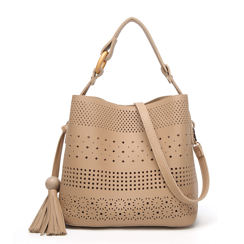 The New Female Tassel Mother Package Wild Fashion Shoulder Messenger Hollow bag
