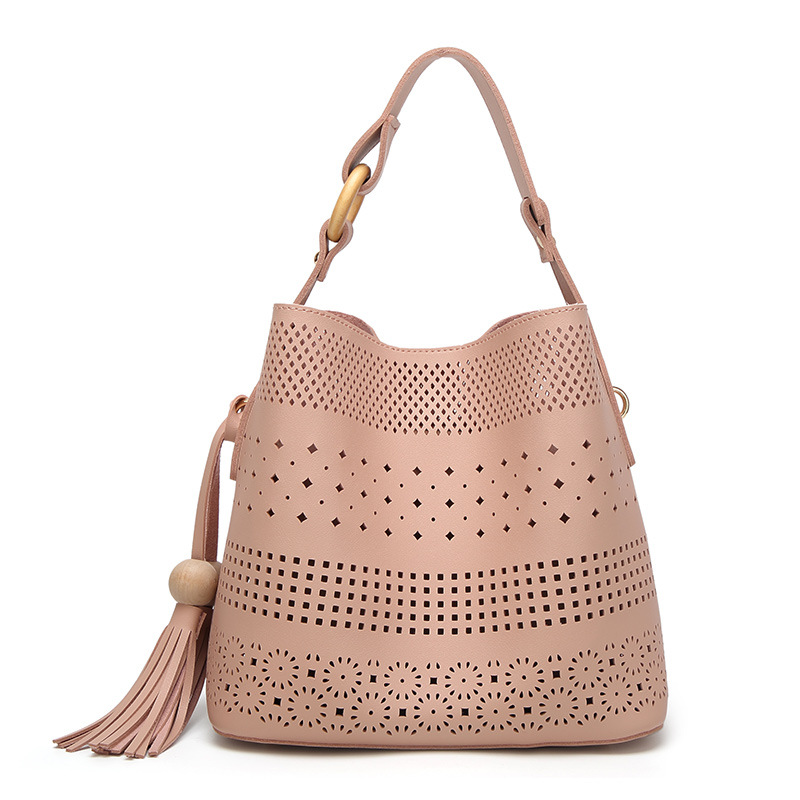 The New Female Tassel Mother Package Wild Fashion Shoulder Messenger Hollow bag