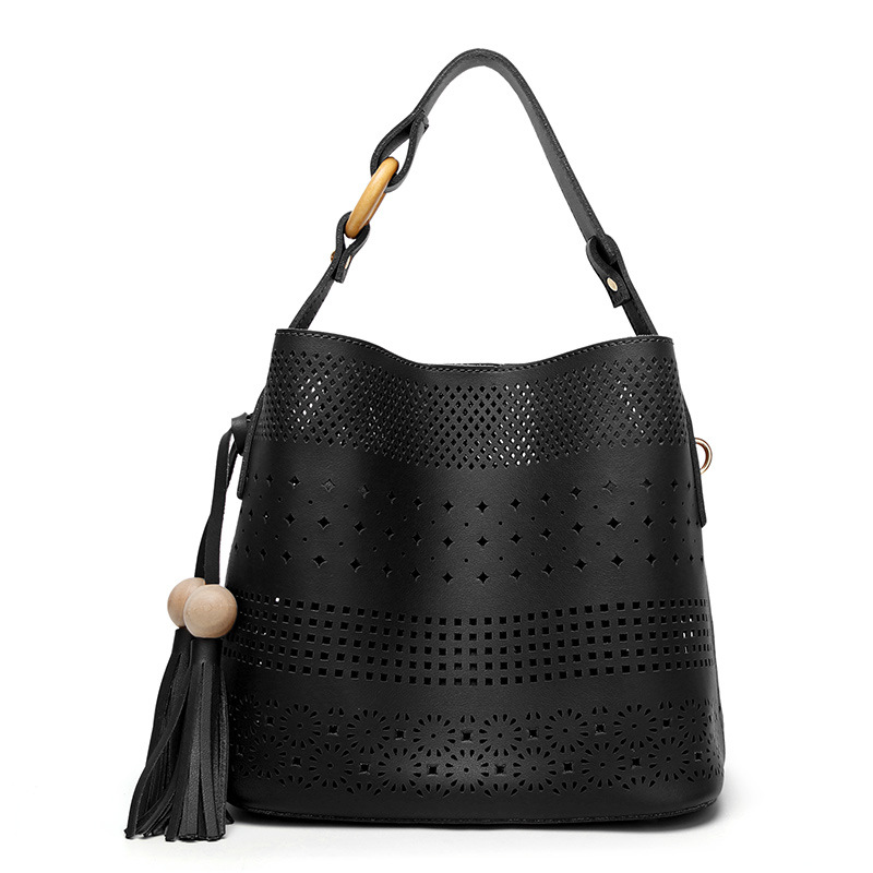 The New Female Tassel Mother Package Wild Fashion Shoulder Messenger Hollow bag