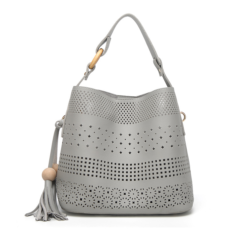 The New Female Tassel Mother Package Wild Fashion Shoulder Messenger Hollow bag