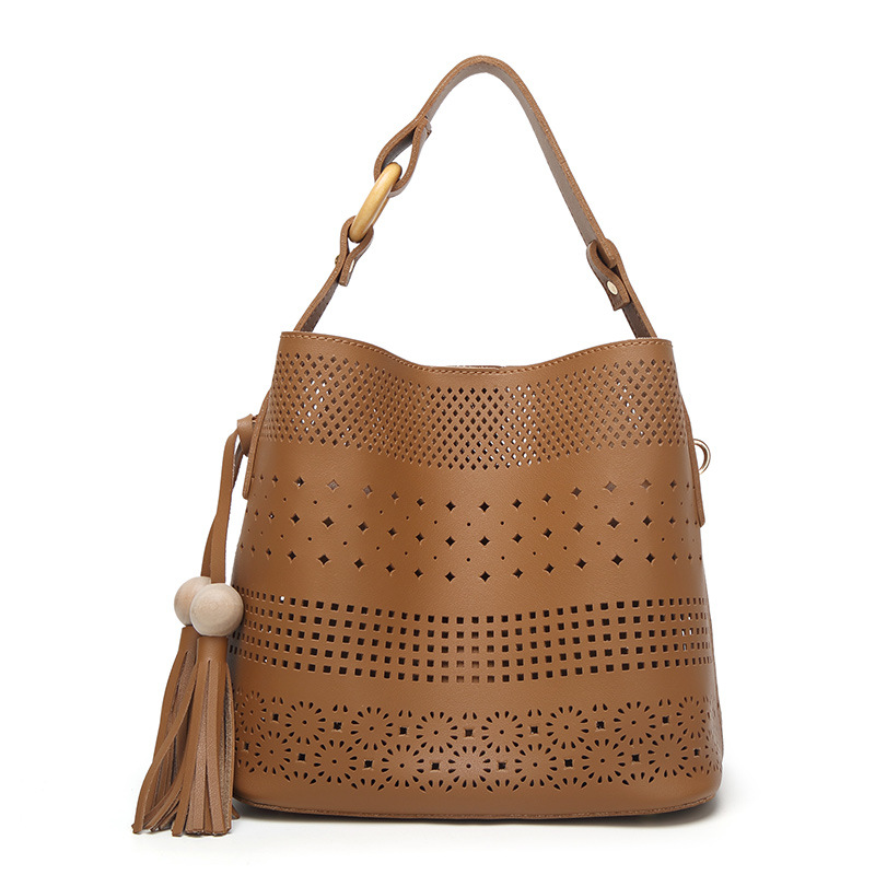 The New Female Tassel Mother Package Wild Fashion Shoulder Messenger Hollow bag