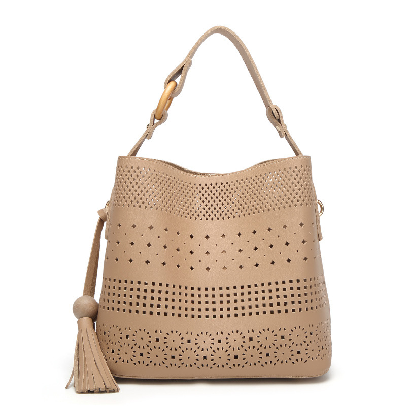 The New Female Tassel Mother Package Wild Fashion Shoulder Messenger Hollow bag
