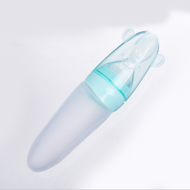 A Newborn Squeezing Feeding Bottle Silicone Training Rice Spoon Infant Supplement Feeder Silicone rice paste bottle feeding spoon for mother and baby auxiliary food Silicone suction cup for children s