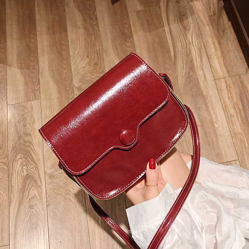 Texture small black bag women's bag messenger bag Korean version simple retro Hong Kong Handbags