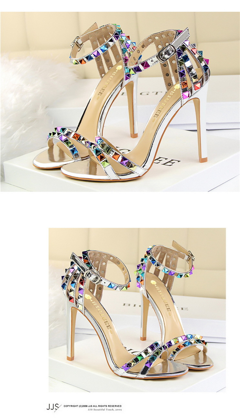 Roman style women's shoes with ultra-high heels and open-toe cut-out coloured rivet sandals