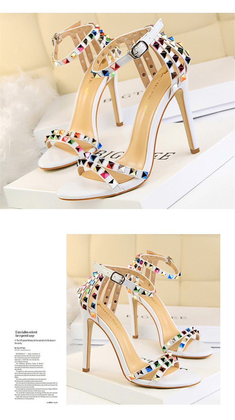 Roman style women's shoes with ultra-high heels and open-toe cut-out coloured rivet sandals