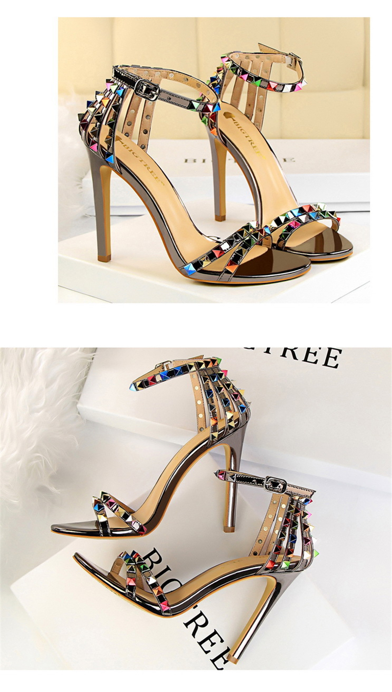 Roman style women's shoes with ultra-high heels and open-toe cut-out coloured rivet sandals