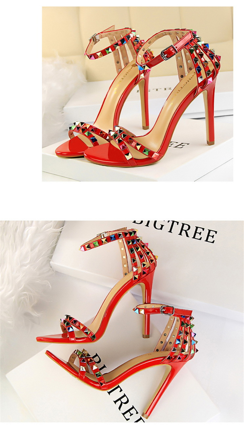 Roman style women's shoes with ultra-high heels and open-toe cut-out coloured rivet sandals