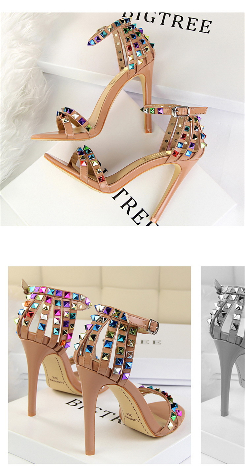 Roman style women's shoes with ultra-high heels and open-toe cut-out coloured rivet sandals