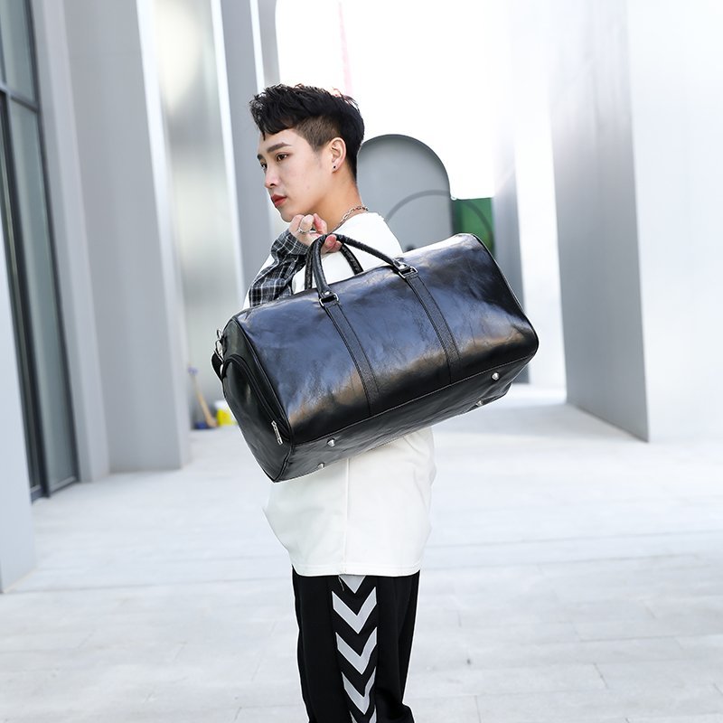 Large Capacity PU Lether Duffle &amp; Gym Bags High Quality Solid Color Partition Finishing Nethong travel bag Men's and women's lightweight waterproof short-distance travel boarding bag Large capacit
