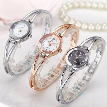 Lady&apos;s steel band student Bracelet life waterproof quartz electronic women&apos;s watch