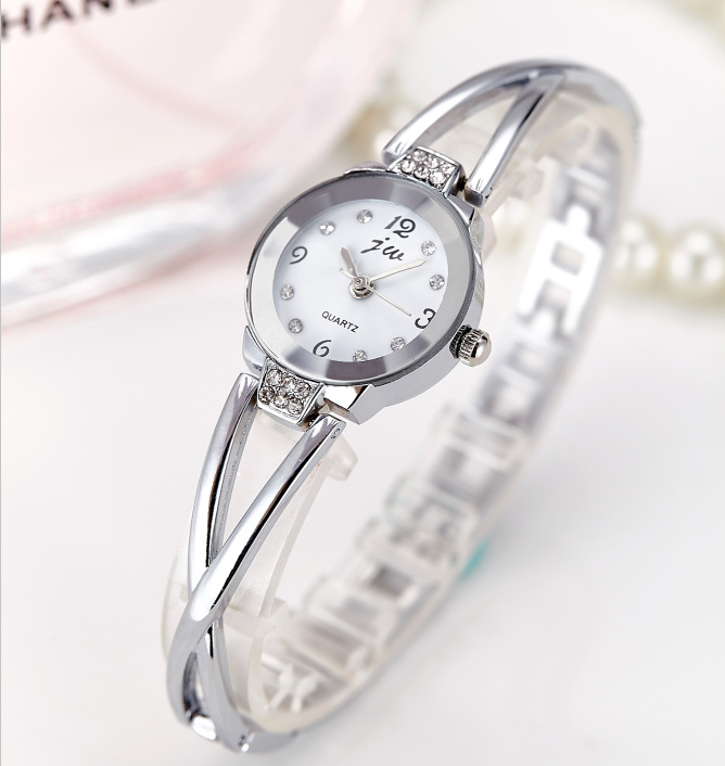 Lady&apos;s steel band student Bracelet life waterproof quartz electronic women&apos;s watch