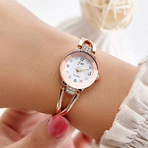 Lady&apos;s steel band student Bracelet life waterproof quartz electronic women&apos;s watch