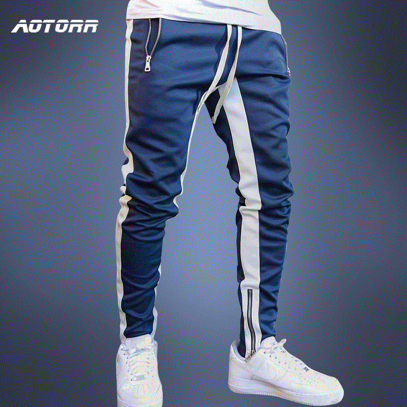 2021 High quality Mens Pants Fitness Men Sportswear Tracksuit Bottoms Skinny pants Casual Trousers Stripe Track Pants