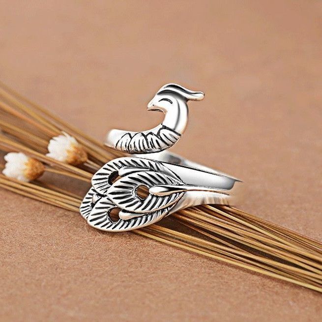 Crochet yarn with thread artifact ring shoe knitting aids opening Phoenix peacock ring belt threader