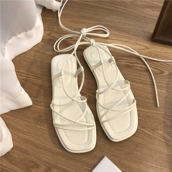 Fairy strap sandals women flat bottom summer new gentle fashion Joker gladiator sandals beach sandals tide