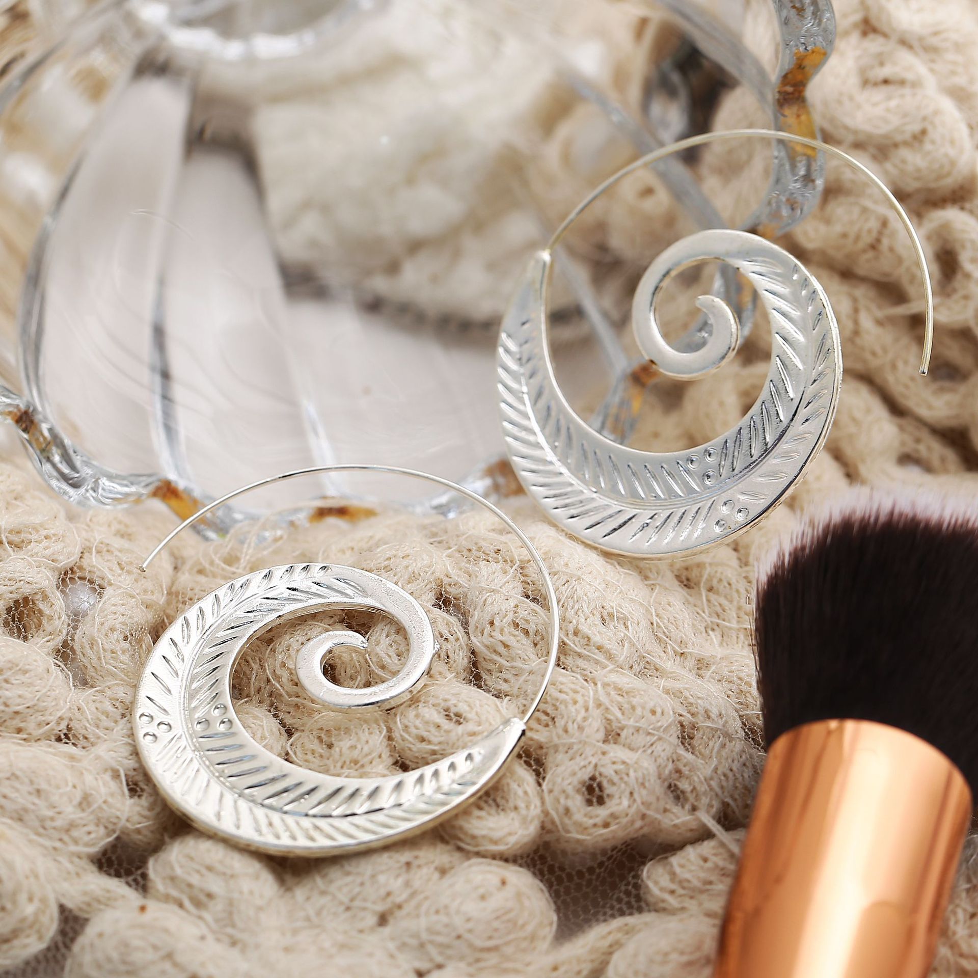 Exaggerated swirl gear-shaped leaf snail shell retro oval spiral type women&apos;s earrings