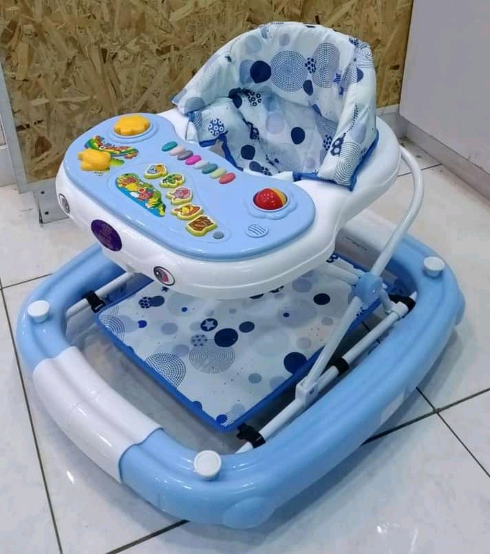 2-1 Baby walker and rocker.and still has music