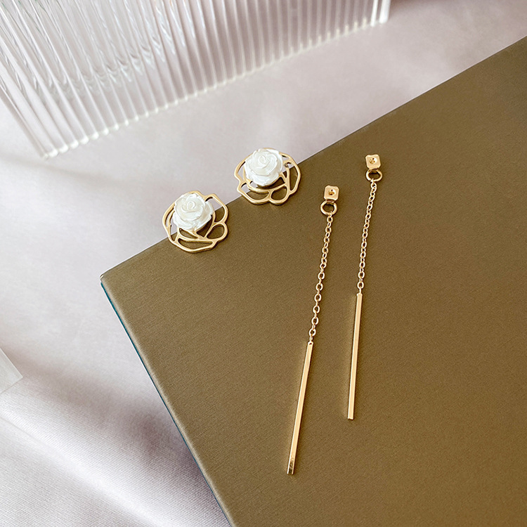 Hong Kong style flower tassel earrings temperament simple long earrings light luxury design mosquito coil plate without ear hole ear clip female
