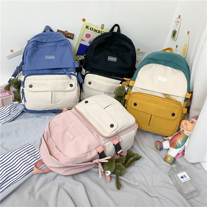 Women's Korean high school super light large capacity backpack women's lovely travel new ins wind backpack canvas schoolbag women's small fresh contrast color Backpack
