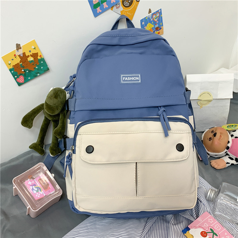 Women's Korean high school super light large capacity backpack women's lovely travel new ins wind backpack canvas schoolbag women's small fresh contrast color Backpack
