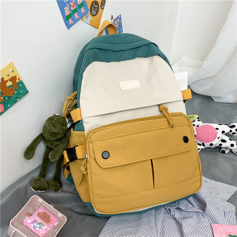 Women's Korean high school super light large capacity backpack women's lovely travel new ins wind backpack canvas schoolbag women's small fresh contrast color Backpack