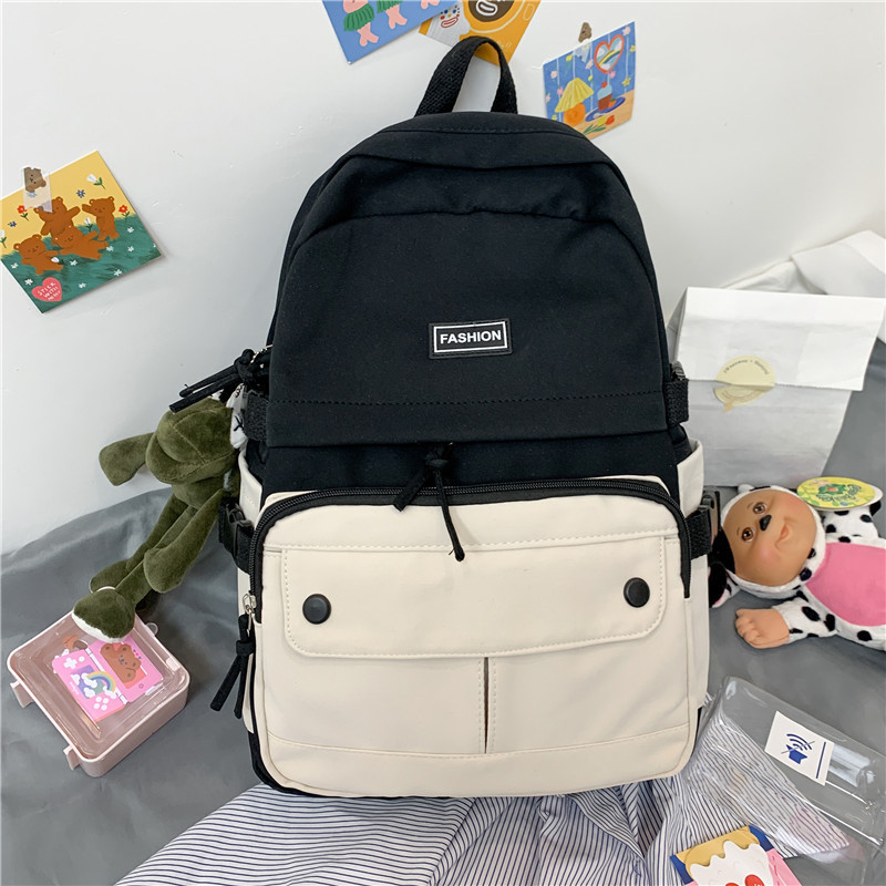 Women's Korean high school super light large capacity backpack women's lovely travel new ins wind backpack canvas schoolbag women's small fresh contrast color Backpack