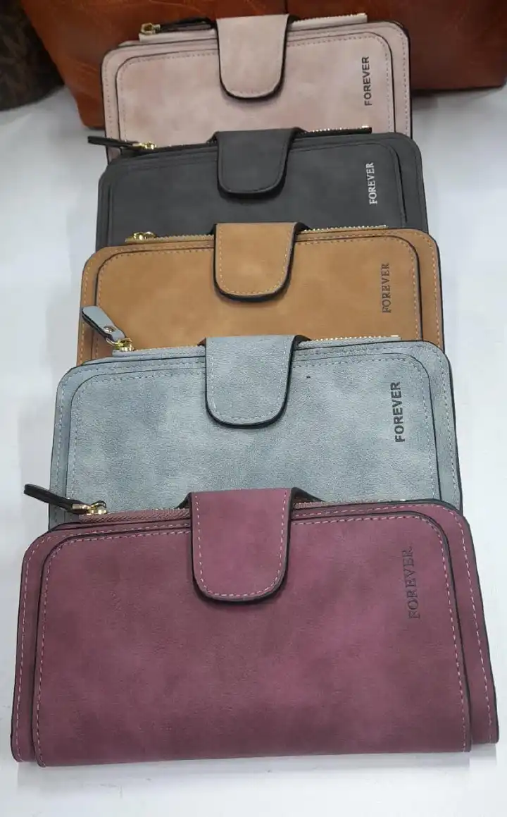 HANDBAGS;FOREVER PURE LEATHER HANDBAG  1 PC FOR ALL LADIES .THE BAGS ARE CUTE AND MODERN TO BE CARRIED WHILE ON A JOURNEY OR IN THE OFFICE  ITS SIZEABLE TO BE  CARRIED BY A HAND