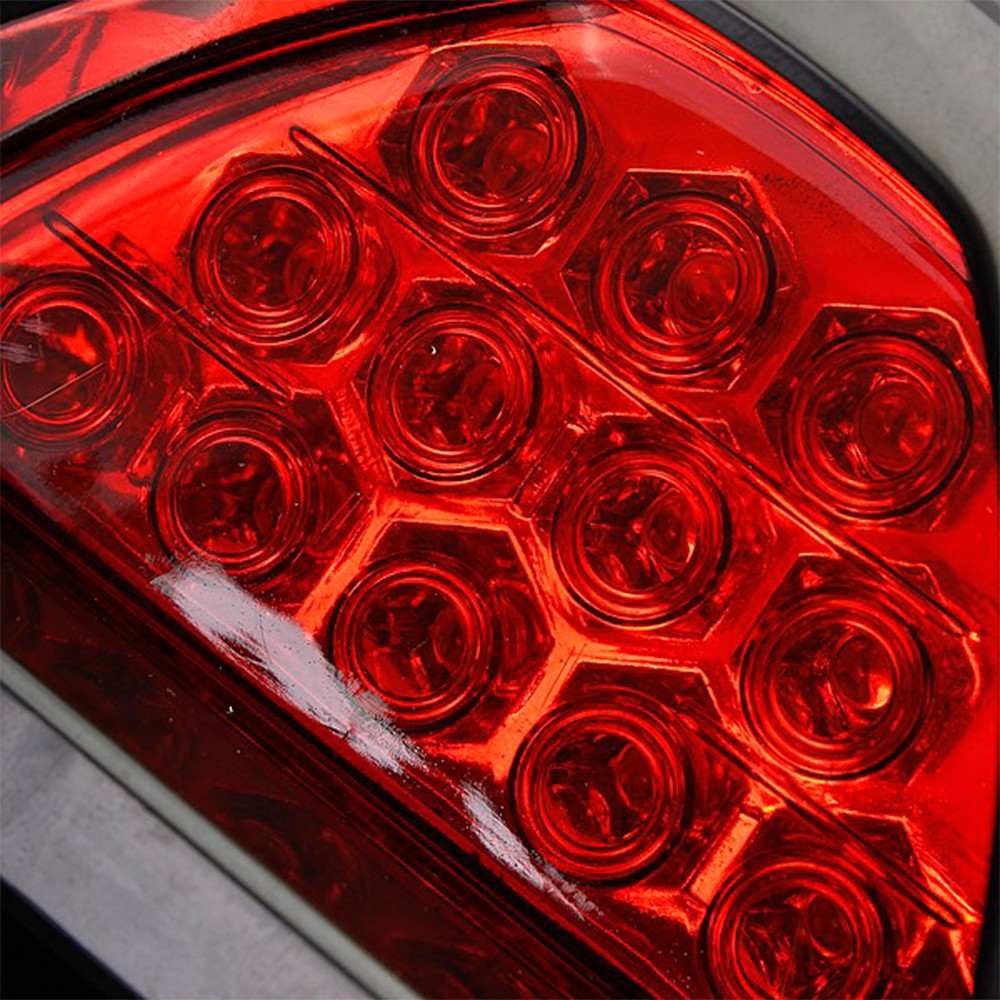 12 LED Universal CarRear Laser Tail Brake DRL Stop Light Auto Fog Lamp F1 Style Triangle