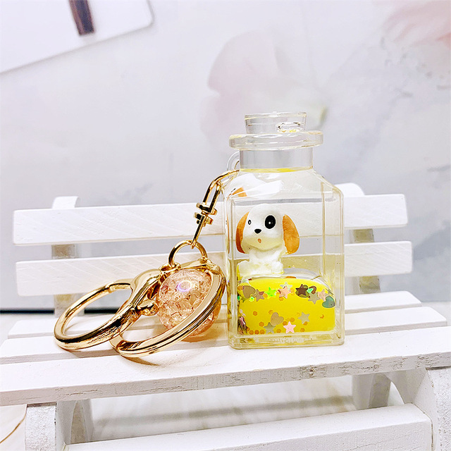 Creative Perfume Bottle Pug Floating Liquid Keychain For Women Bag Pendant Cartoon Quicksand Liquid Wishing Bottle Keyring Gifts
