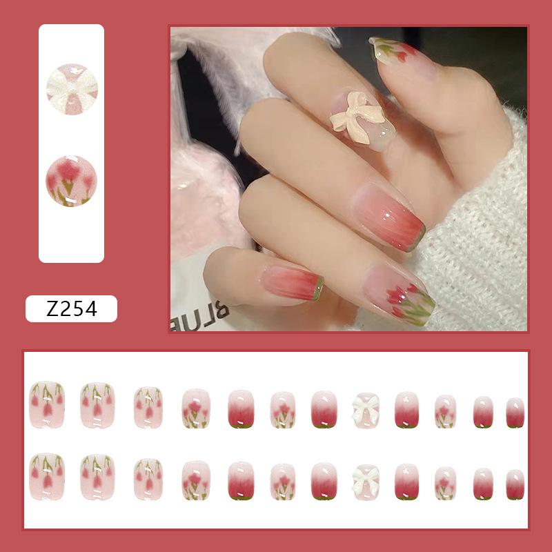 24 pieces of fake nails wearing a fresh powder green bow box