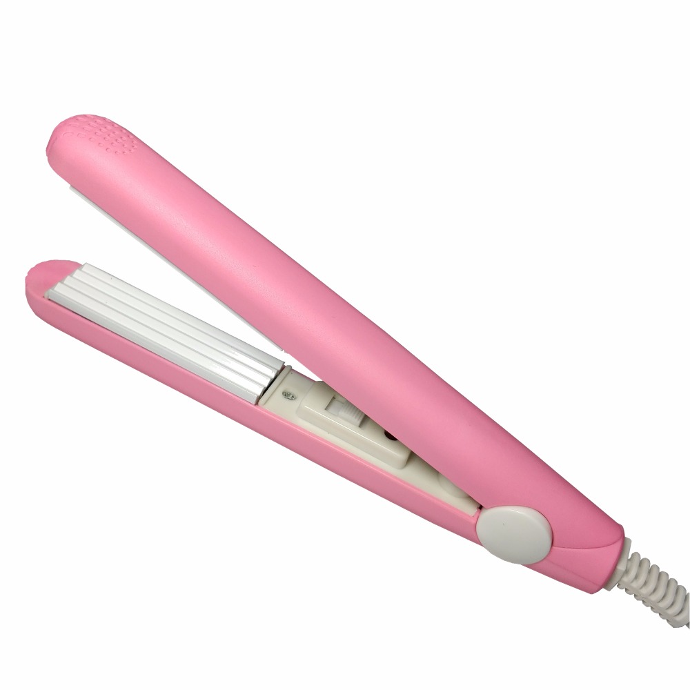 A mini hair iron pink corrugated plate electric curling iron curl modelling tools
