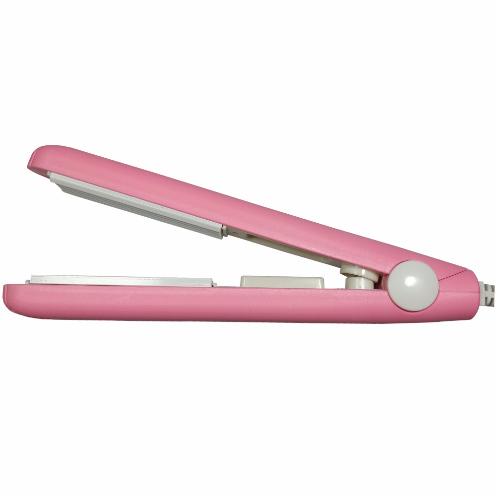 A mini hair iron pink corrugated plate electric curling iron curl modelling tools