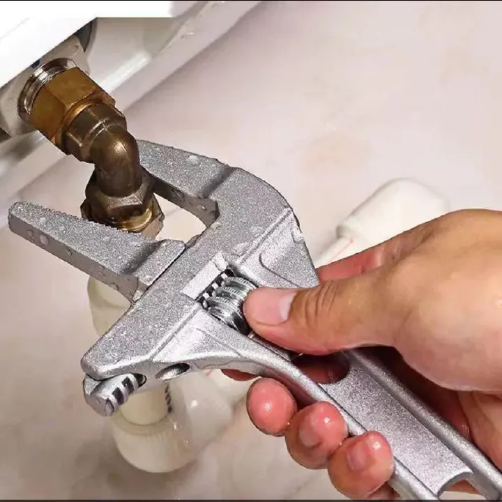 car maintenance" or "automobile repair Adjustable wrench for automotive pipe repair The large opening wrench is designed with a wide jaw that allows it to accommodate a variety of sizes of nuts and bo
