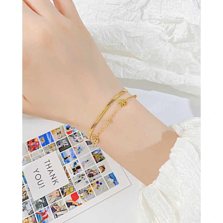 New retro and versatile snake bone chain bracelet for women, fashionable and simple stainless steel double layer tree of life bracelet for women